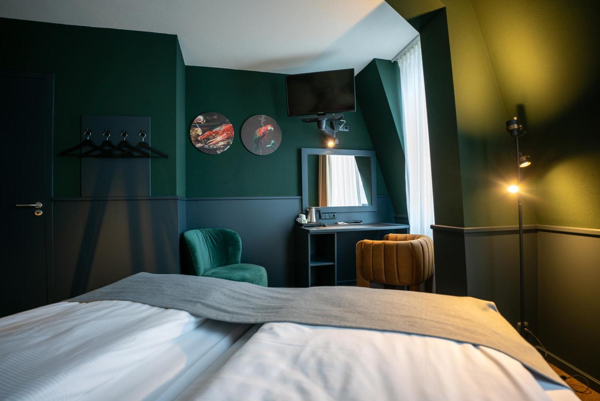 Stadshotel เฮร์เลิน ภายนอก รูปภาพ